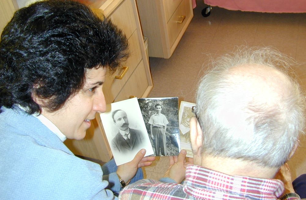 Brenda Avadian and her father Martin Avadian looking at pictures